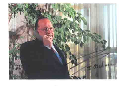 a photo with signature of the prime minister Dehaene and a letter autographed by Dehaene.